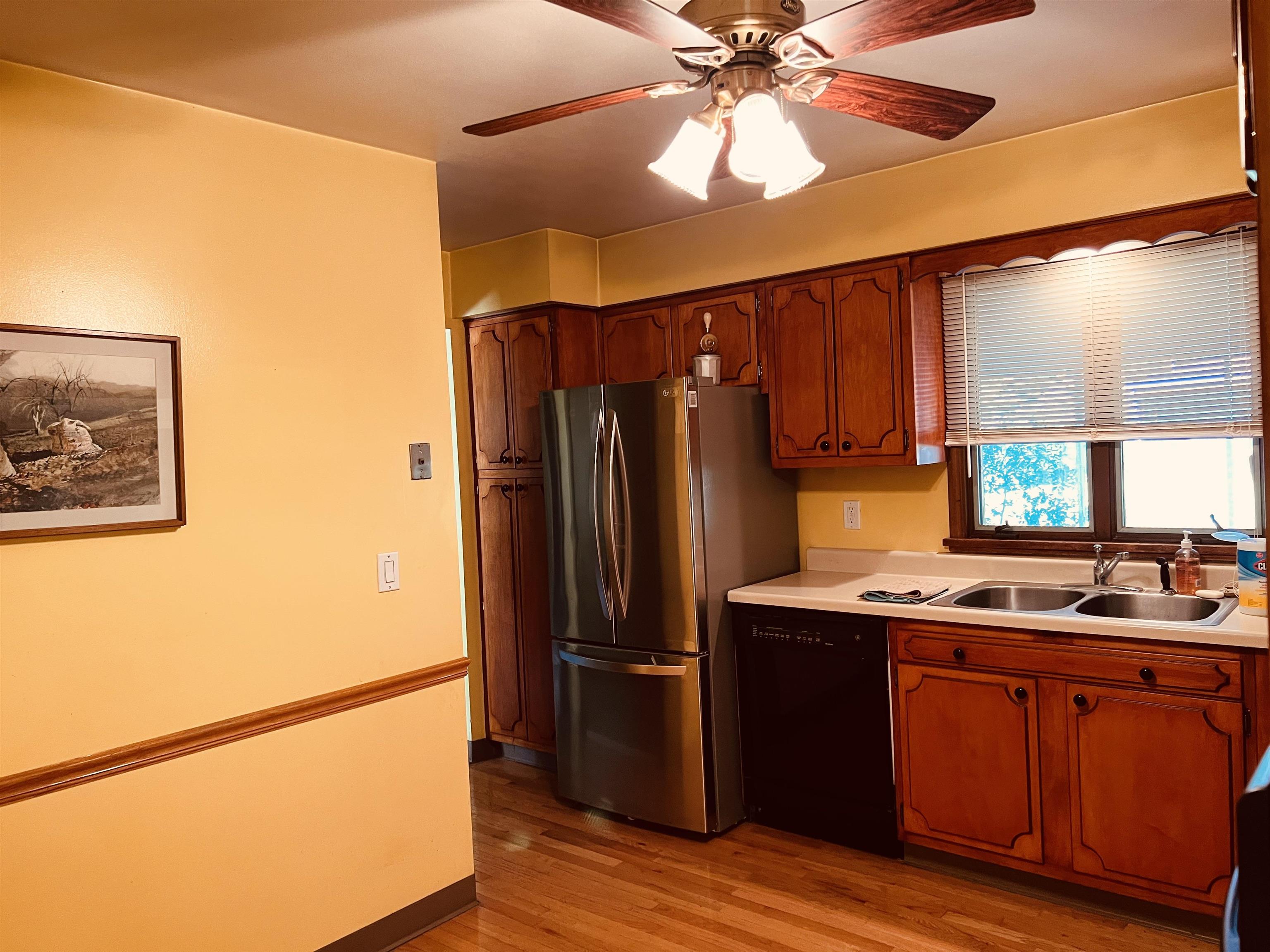 1216 Hillcrest Road Rockford, IL 61108 - Photo 5 of 13 a kitchen with stainless steel appliances granite countertop a refrigerator a sink and dishwasher
