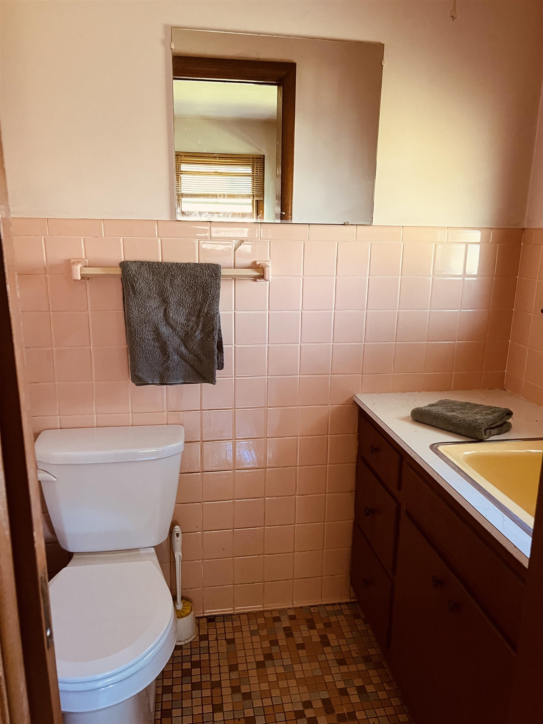 1216 Hillcrest Road Rockford, IL 61108 - Photo 7 of 13 a bathroom with a toilet and a sink