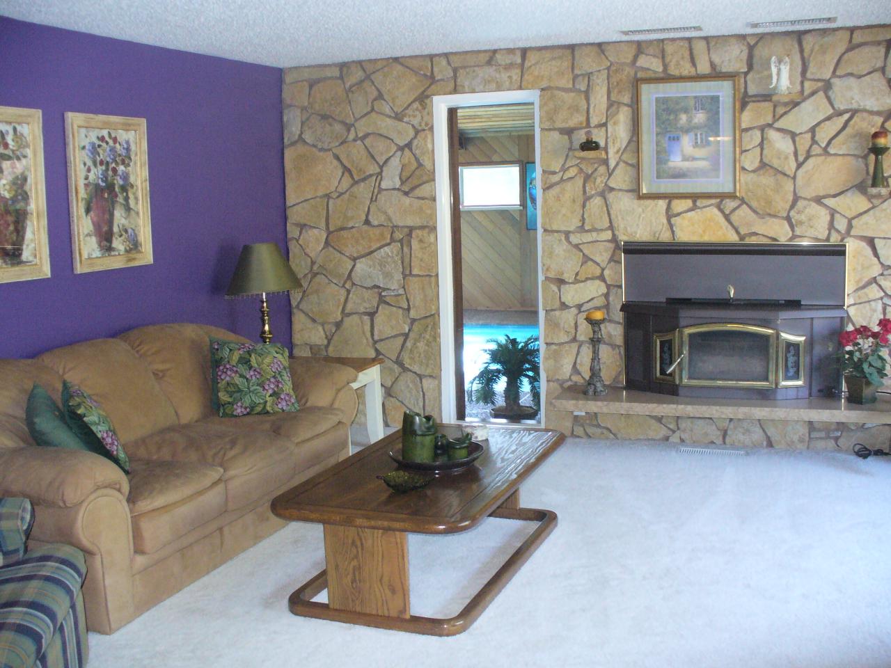 1022 Scoon Road Sunnyside, WA 98944 - Photo 4 of 5 a living room with furniture and a fireplace