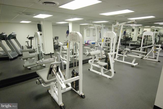 1200 North Nash Street, Unit 262 Arlington, VA 22209 - Photo 15 of 20 a view of a room with gym equipment