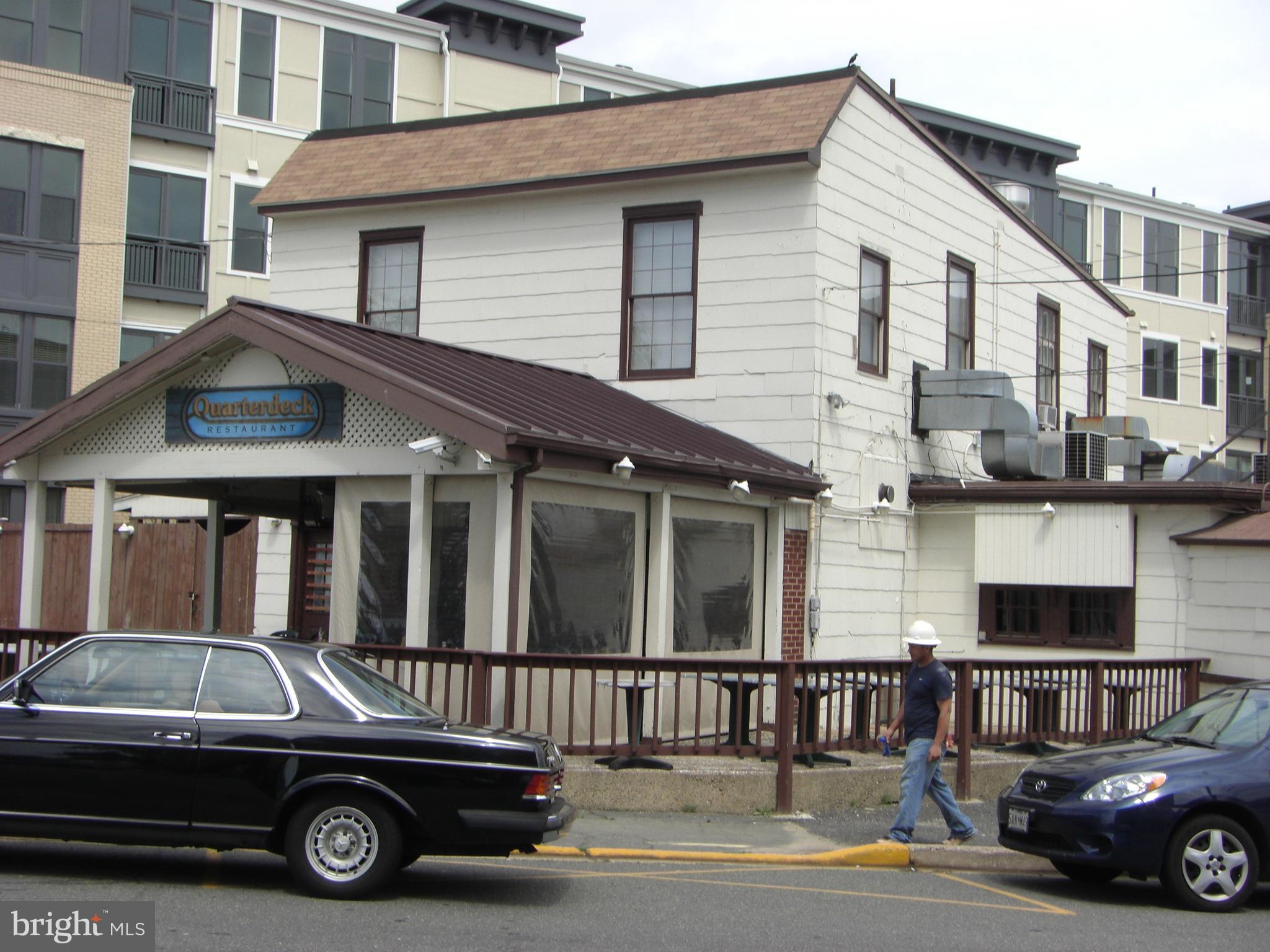 1200 North Nash Street, Unit 262 Arlington, VA 22209 - Photo 18 of 20 a car parked in front of a house