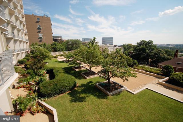1200 North Nash Street, Unit 262 Arlington, VA 22209 - Photo 19 of 20 an aerial view of a house with yard swimming pool and outdoor seating