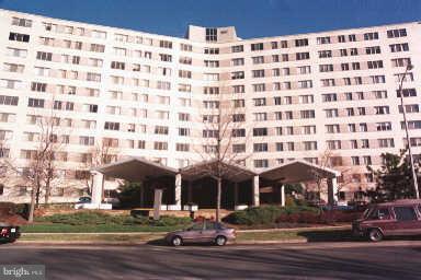 1200 North Nash Street, Unit 262 Arlington, VA 22209 - Photo 2 of 20 a front view of a building