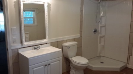 1011 Lee King Road Forsyth, GA 31029 - Photo 21 of 26 a bathroom with a sink toilet and shower