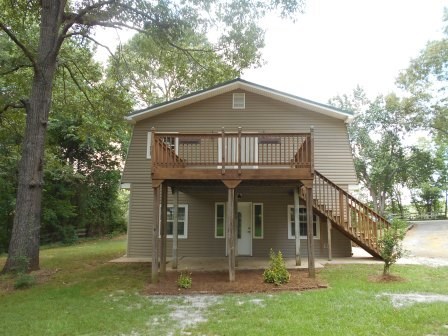 1011 Lee King Road Forsyth, GA 31029 - Photo 23 of 26 a view of a house with a yard