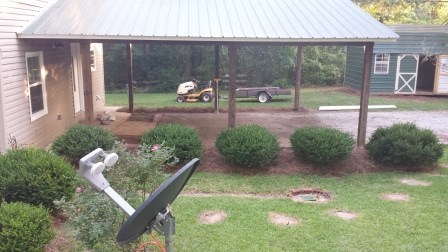 1011 Lee King Road Forsyth, GA 31029 - Photo 25 of 26 a view of a chair and table in the patio with a backyard