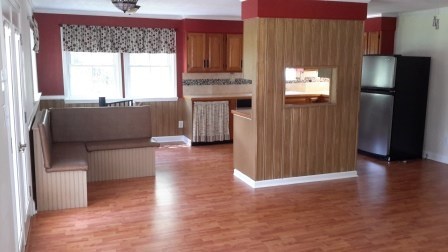 1011 Lee King Road Forsyth, GA 31029 - Photo 4 of 26 a view of a kitchen with a refrigerator and a window