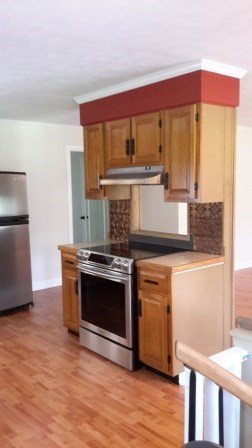 1011 Lee King Road Forsyth, GA 31029 - Photo 8 of 26 a kitchen with stainless steel appliances granite countertop a stove a sink and a refrigerator