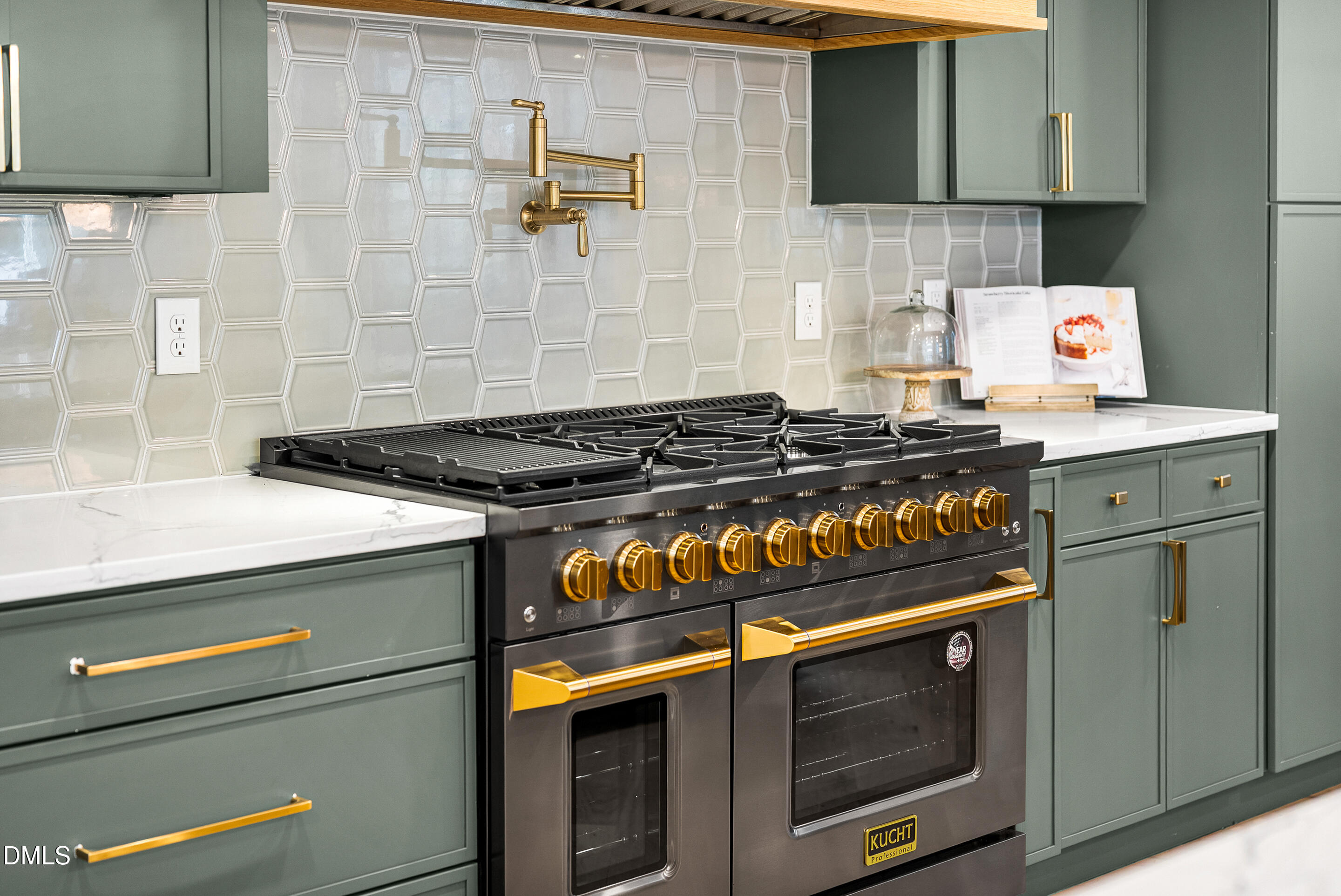 1232 Somerset Road Raleigh, NC 27610 - Photo 12 of 46 a kitchen with granite countertop a stove and a sink