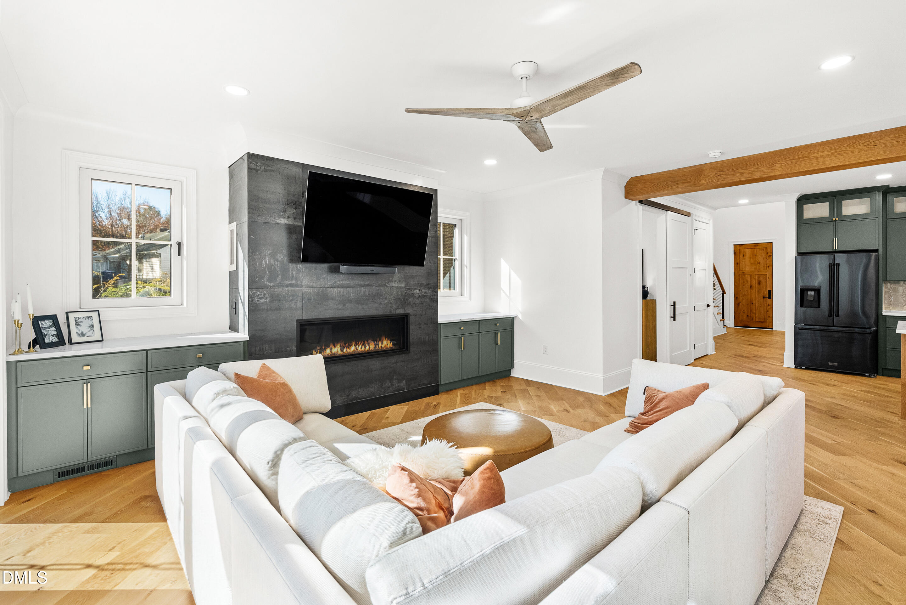 1232 Somerset Road Raleigh, NC 27610 - Photo 14 of 46 a living room with fireplace furniture and a flat screen tv