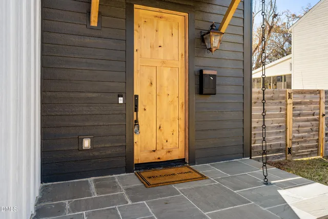 a view of door and wooden door