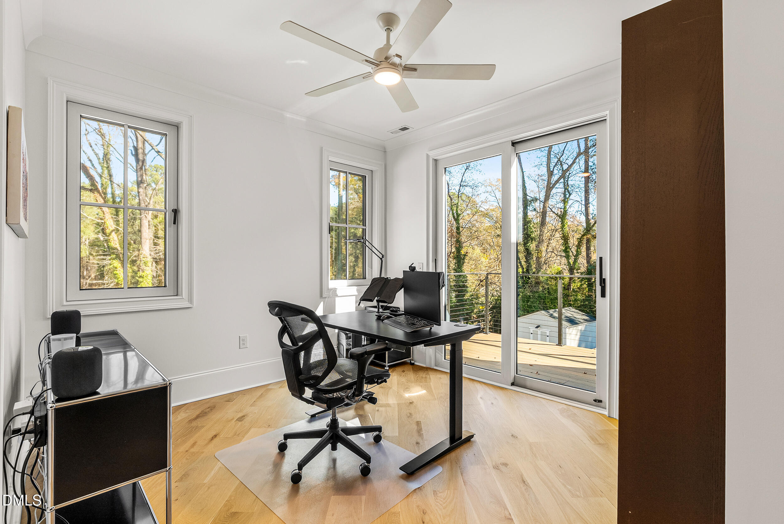 1232 Somerset Road Raleigh, NC 27610 - Photo 30 of 46 a workspace with wooden floor and a window