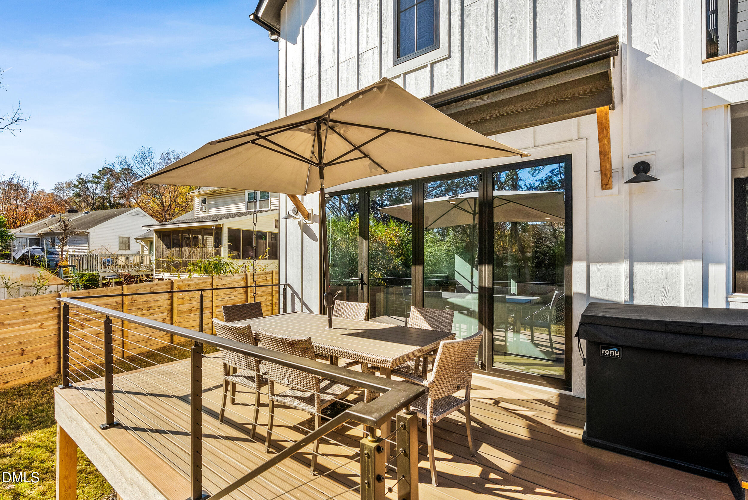 1232 Somerset Road Raleigh, NC 27610 - Photo 47 of 57 a view of a patio with a table and chairs