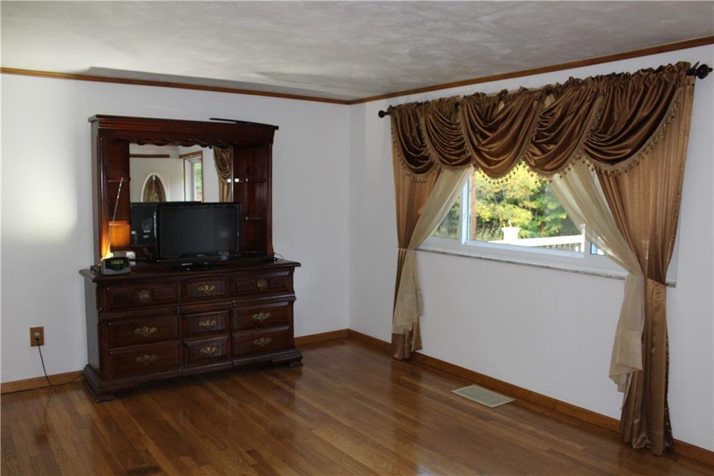 240 State Line Road Burgettstown, PA 15021 - Photo 12 of 42 a room with a window and a mirror