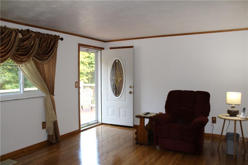 240 State Line Road Burgettstown, PA 15021 - Photo 13 of 42 a living room with furniture and a window