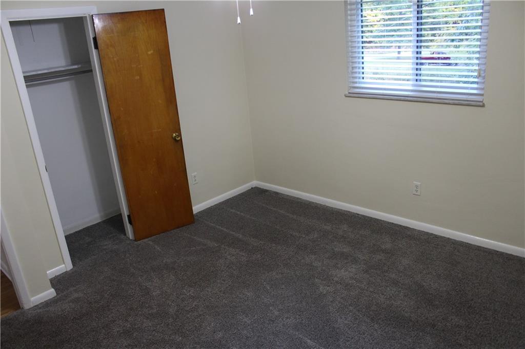 240 State Line Road Burgettstown, PA 15021 - Photo 18 of 42 an empty room with windows and closet