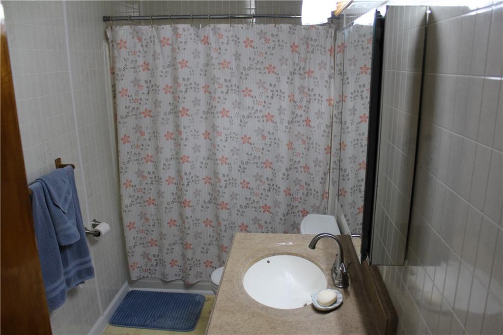 240 State Line Road Burgettstown, PA 15021 - Photo 21 of 42 a bathroom with a sink and a mirror