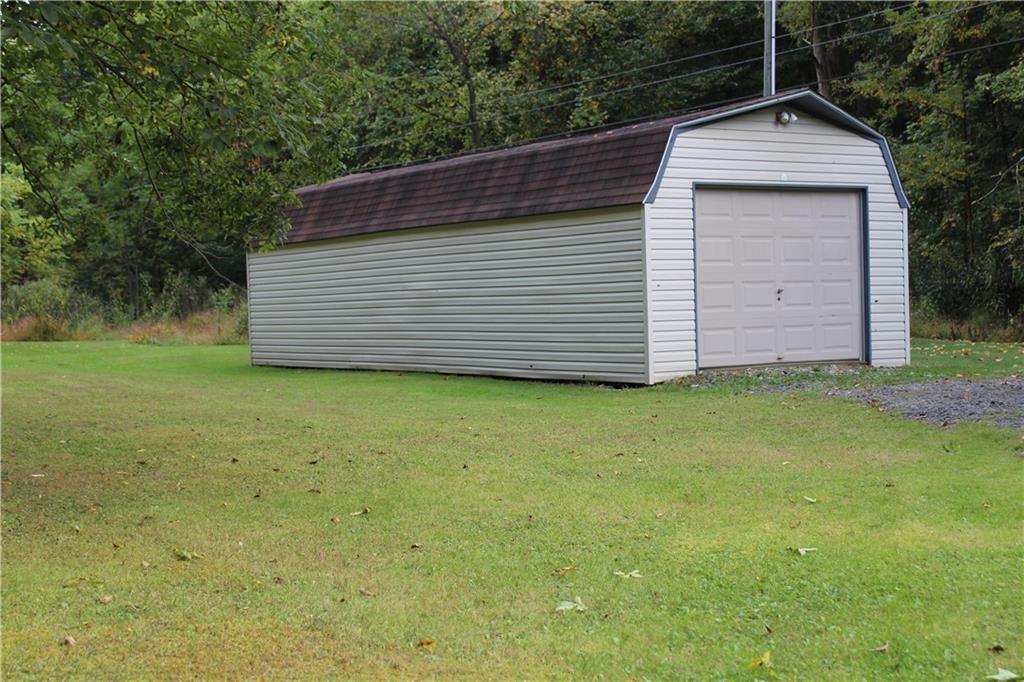 240 State Line Road Burgettstown, PA 15021 - Photo 37 of 42 a side view of a house with a yard