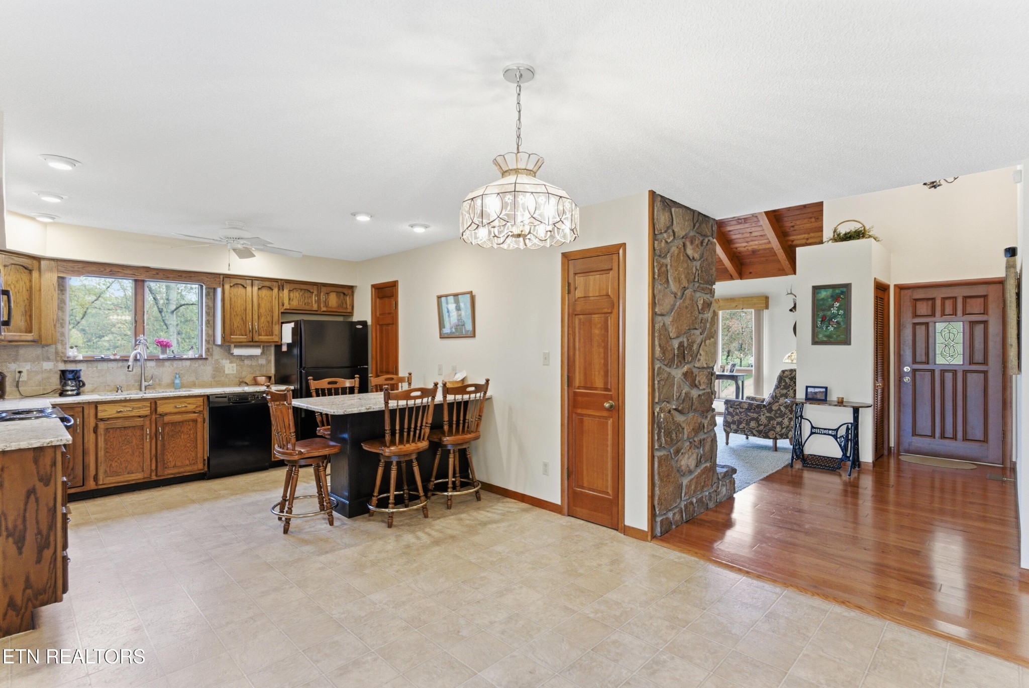 122 Fox Hunter Road Maynardville, TN 37807 - Photo 14 of 60 a view of a dining room with furniture window and wooden floor
