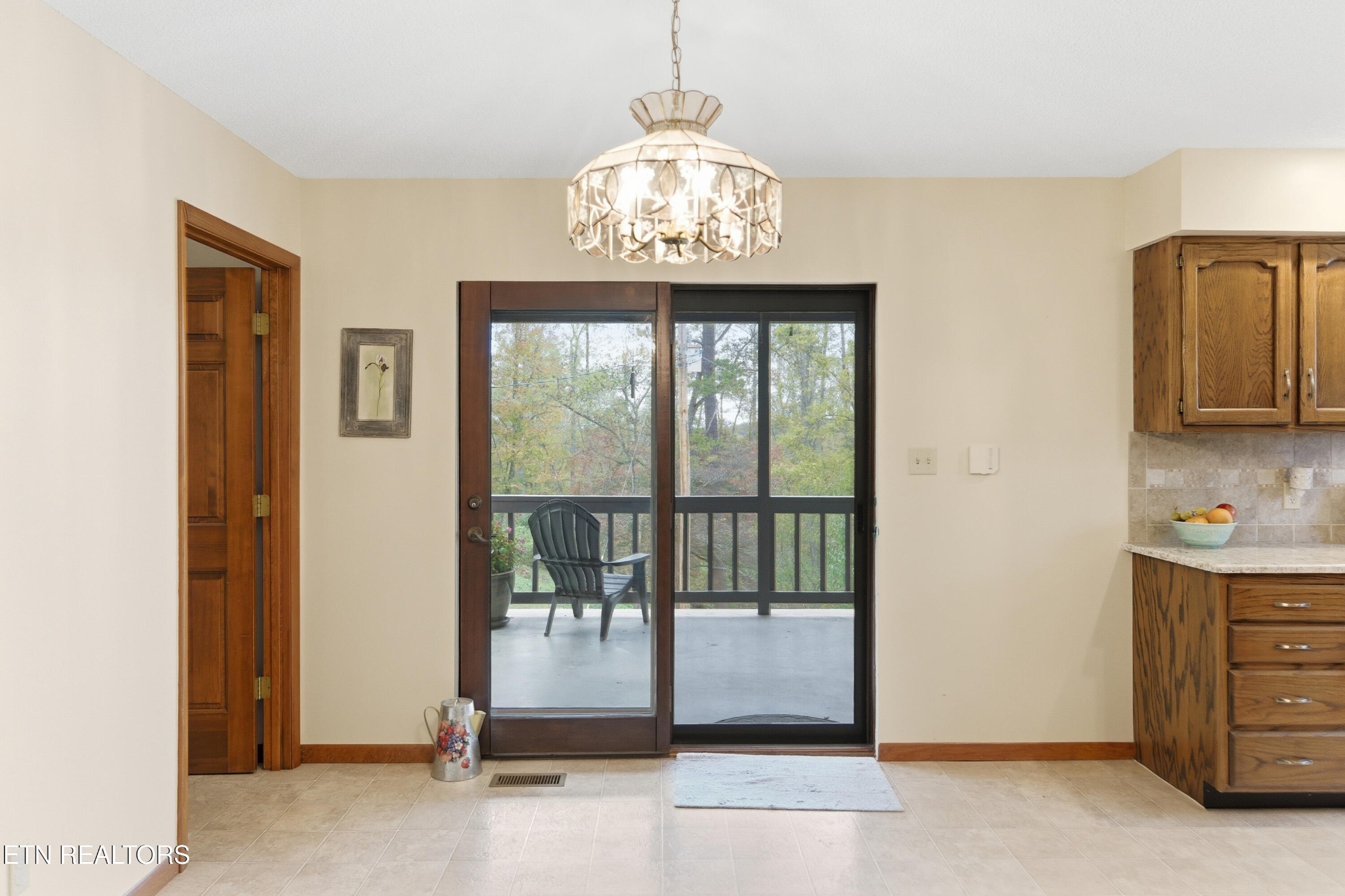 122 Fox Hunter Road Maynardville, TN 37807 - Photo 20 of 60 a view of a hallway with windows and chandelier