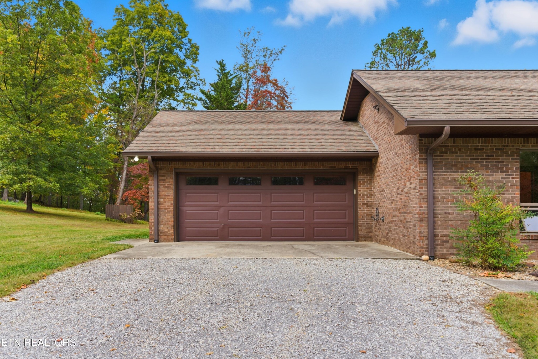 122 Fox Hunter Road Maynardville, TN 37807 - Photo 5 of 60 a front view of a house with a yard and garage