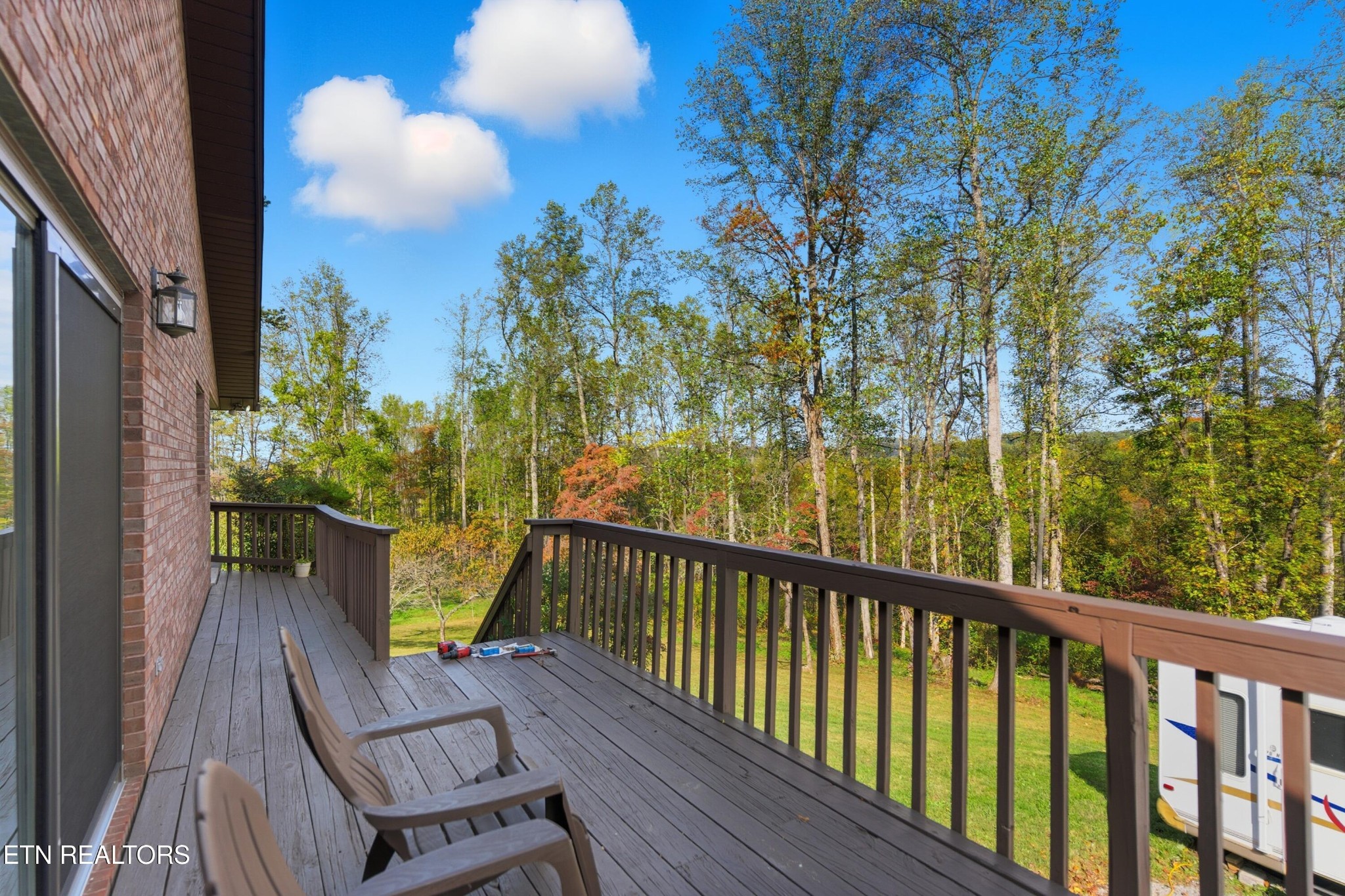 122 Fox Hunter Road Maynardville, TN 37807 - Photo 51 of 60 a view of balcony with wooden floor and seating space