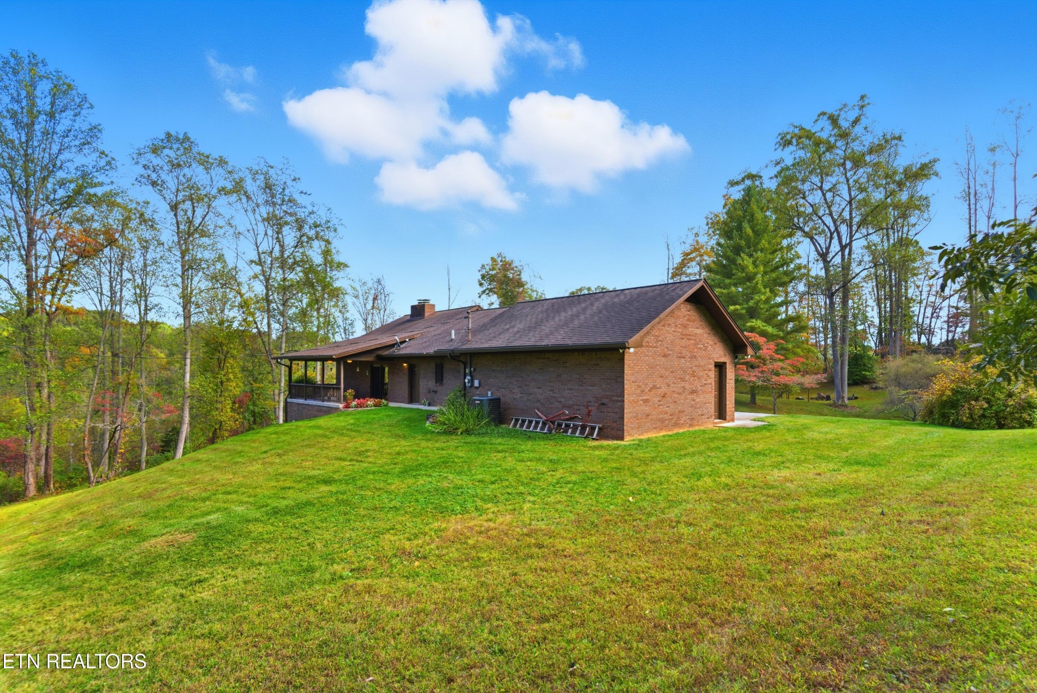 122 Fox Hunter Road Maynardville, TN 37807 - Photo 56 of 60 a house view with a garden space