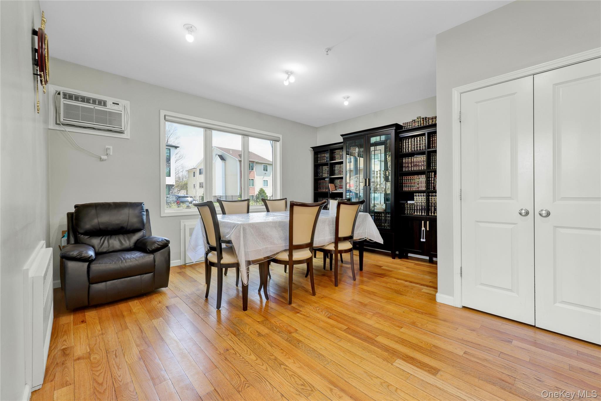 462 West Central Avenue, Unit 120 Spring Valley, NY 10977 - Photo 8 of 21 a view of a livingroom with furniture window and wooden floor