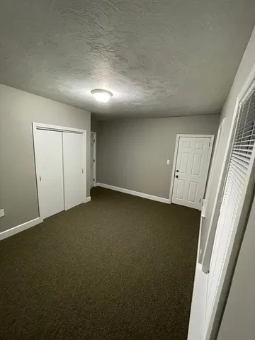 an empty room with a door