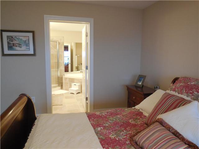 7100 Dale Ridge Road, Unit D4 Lancaster, TN 38569 - Photo 12 of 16 Peak across the room to see your bath suite. Just inside is a separate shower, Jacuzzi tub, and double vanities!