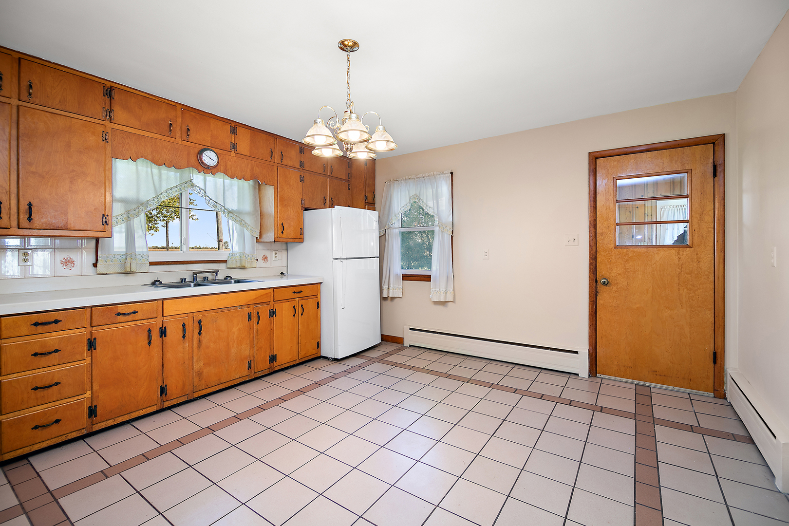 76 South 7000W Road Kankakee, IL 60901 - Photo 9 of 18 a view of a kitchen with a sink