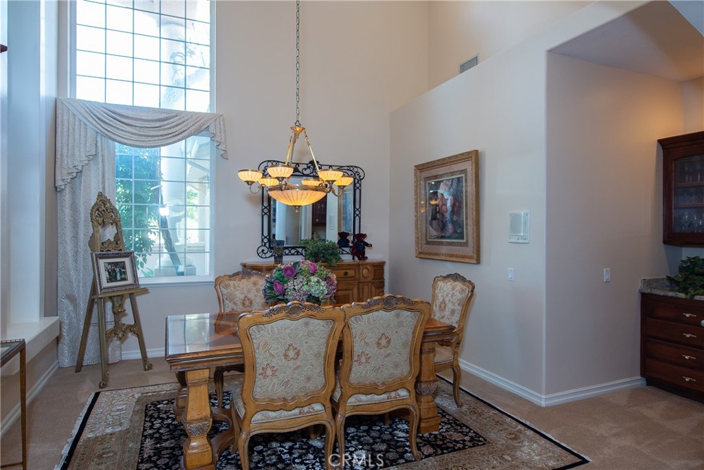 7361 Via Vista Riverside, CA 92506 - Photo 15 of 34 a view of a dining room with furniture window and outside view