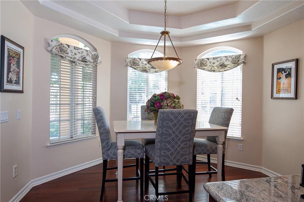 7361 Via Vista Riverside, CA 92506 - Photo 18 of 34 a dining room with furniture a chandelier and window