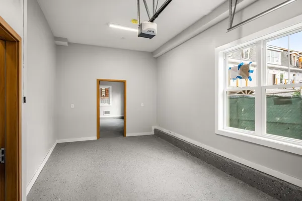 a view of an empty room with a window