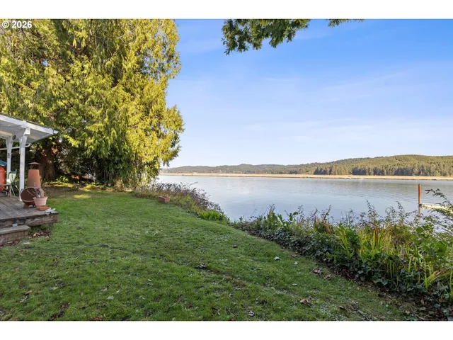 a view of a lake with a big yard