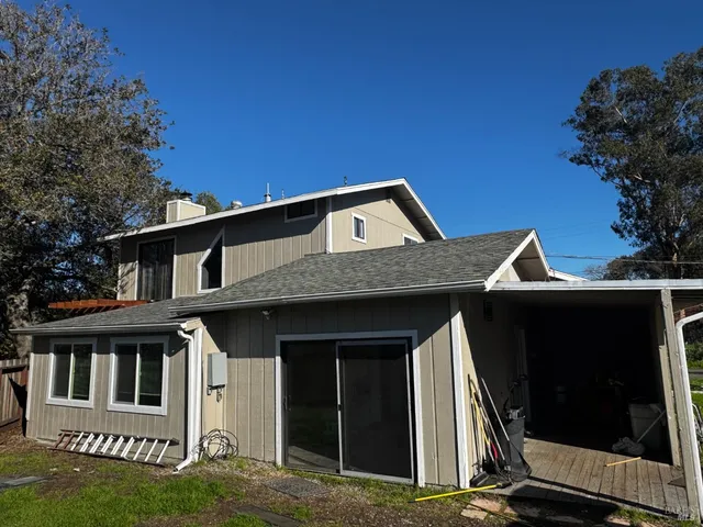 a front view of a house with garage