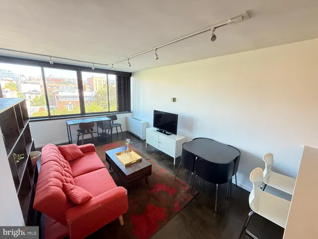 a room with furniture or outdoor view and a window