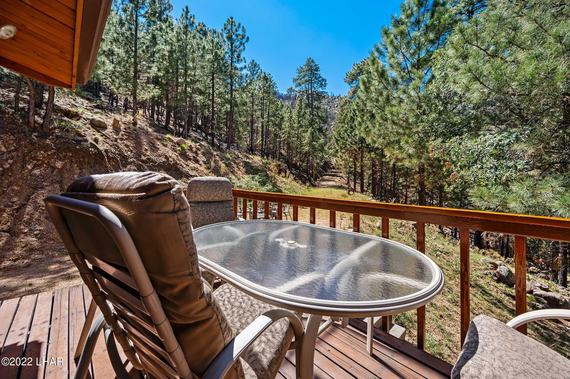 6712 Flag Mine Road Kingman, AZ 86401 - Photo 51 of 72 Morning coffee on the deck.