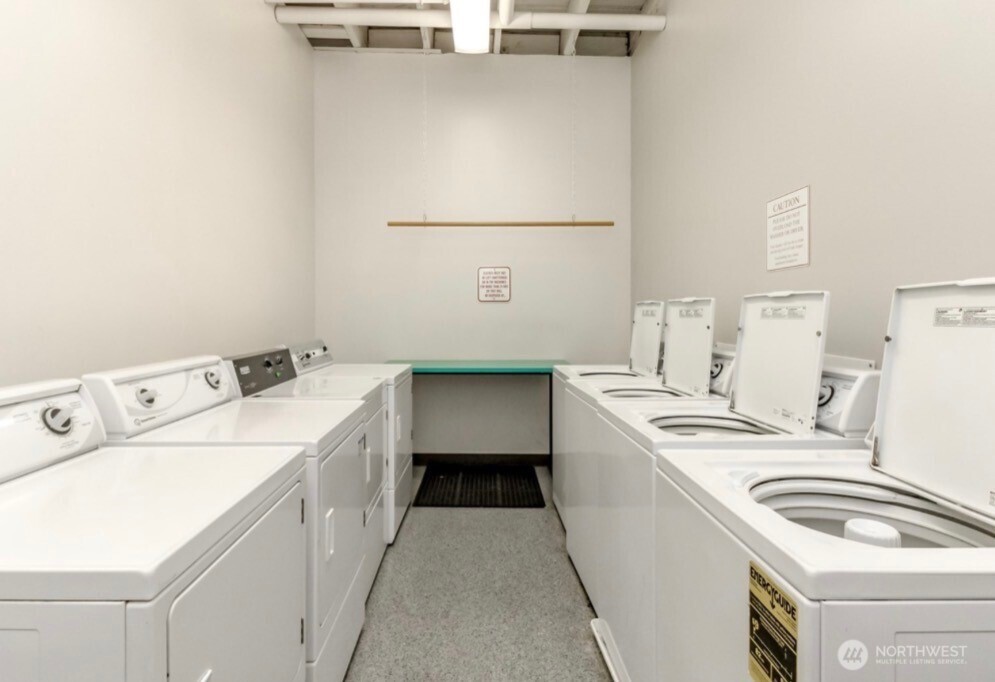 1120 Cliff Street, Unit 211 Tacoma, WA 98402 - Photo 11 of 20 a utility room with dryer and washer