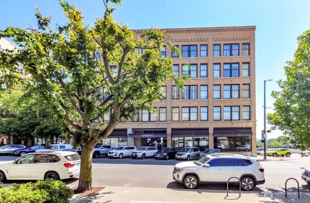 1120 Cliff Street, Unit 211 Tacoma, WA 98402 - Photo 20 of 20 a car parked in front of a building