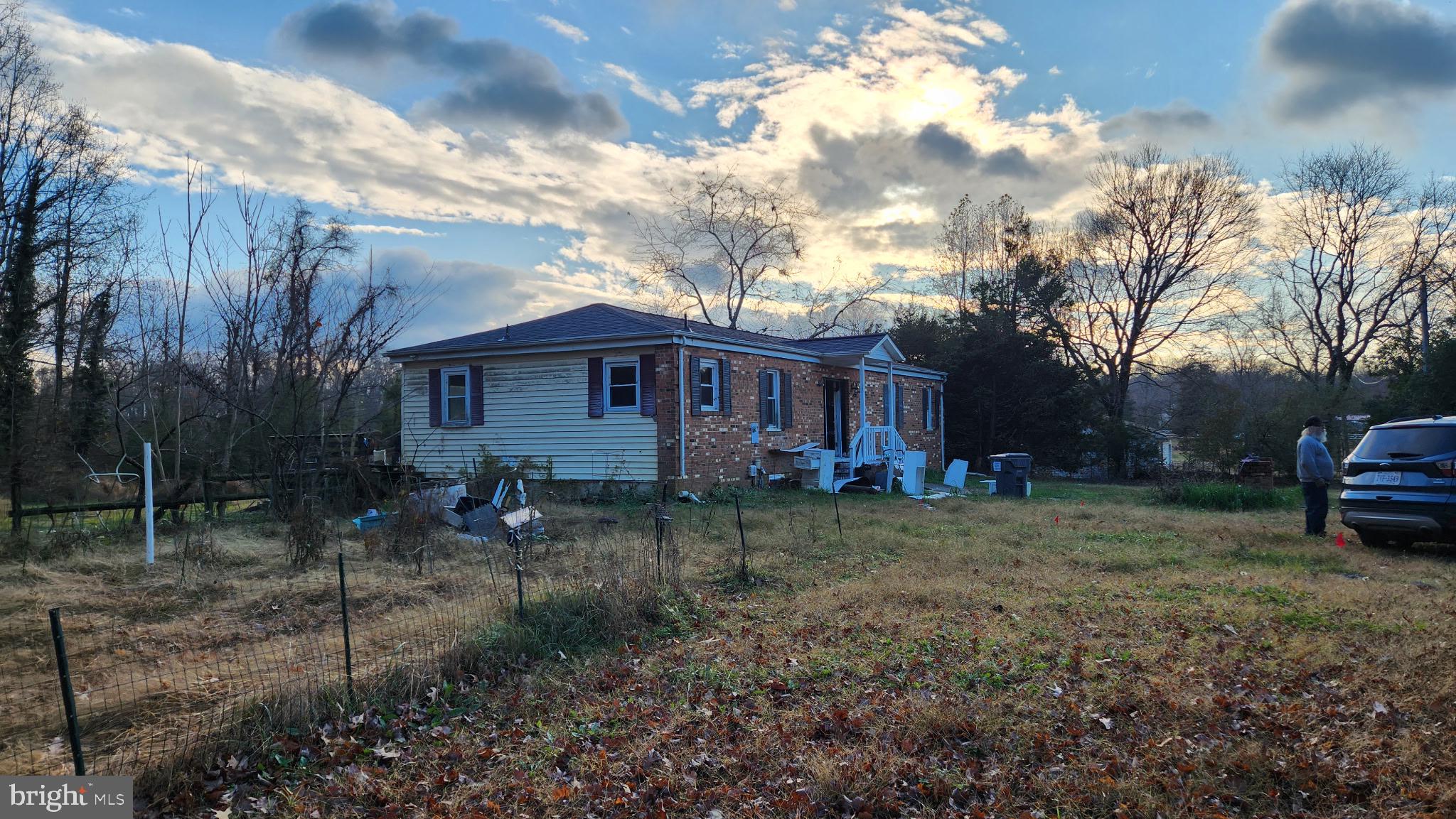 14130 Chotank Loop King George, VA 22485 - Photo 1 of 17 a view of a house with a yard