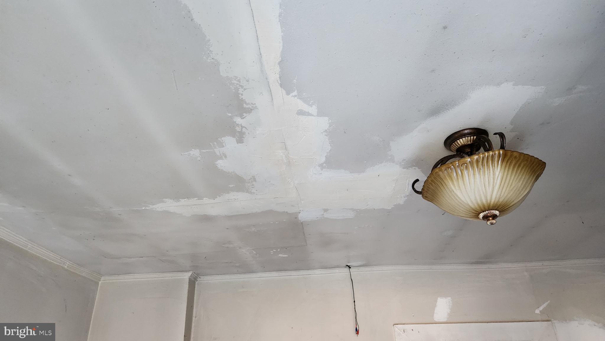 14130 Chotank Loop King George, VA 22485 - Photo 11 of 17 a view of a chandelier fan and wooden floor