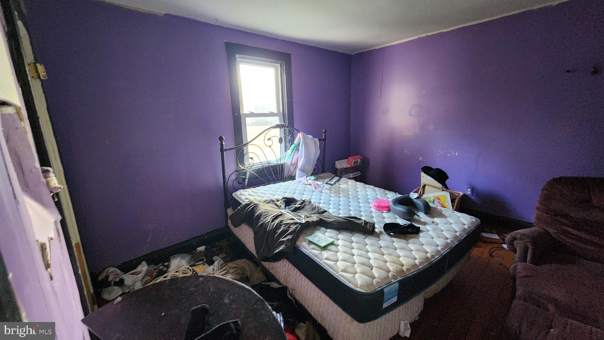 14130 Chotank Loop King George, VA 22485 - Photo 16 of 17 a bedroom with bed and a window