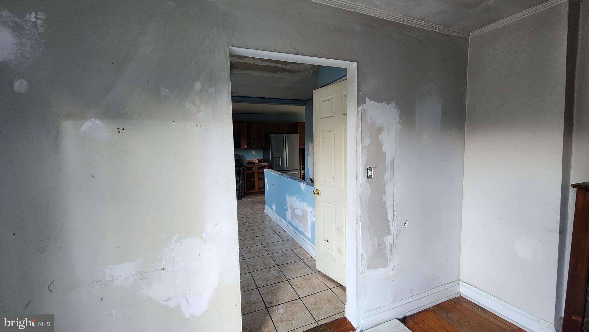 14130 Chotank Loop King George, VA 22485 - Photo 8 of 17 a view of a hallway with wooden floor