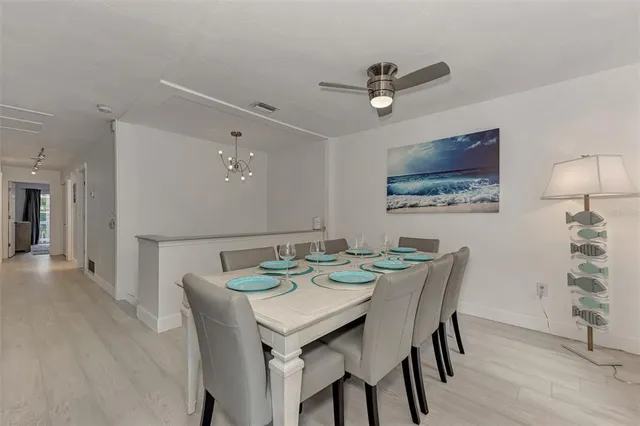 a kitchen with kitchen island wooden cabinets and counter space