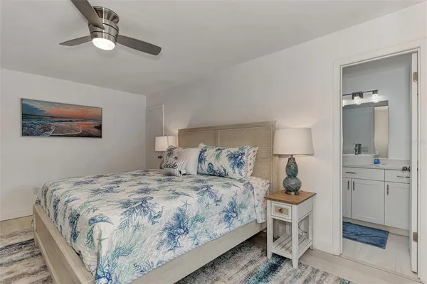 a bedroom with a bed and a walk in closet