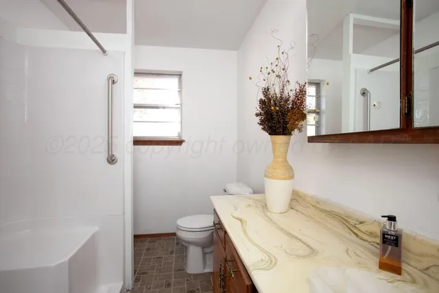 a view of a backyard of the house