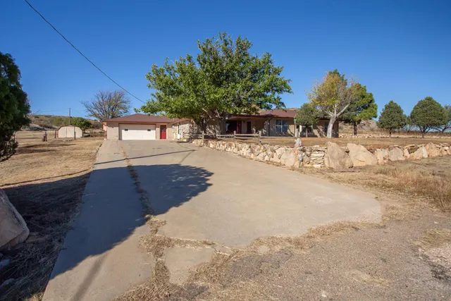 a view of a house with a garage