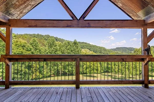 a view of balcony with wooden floor