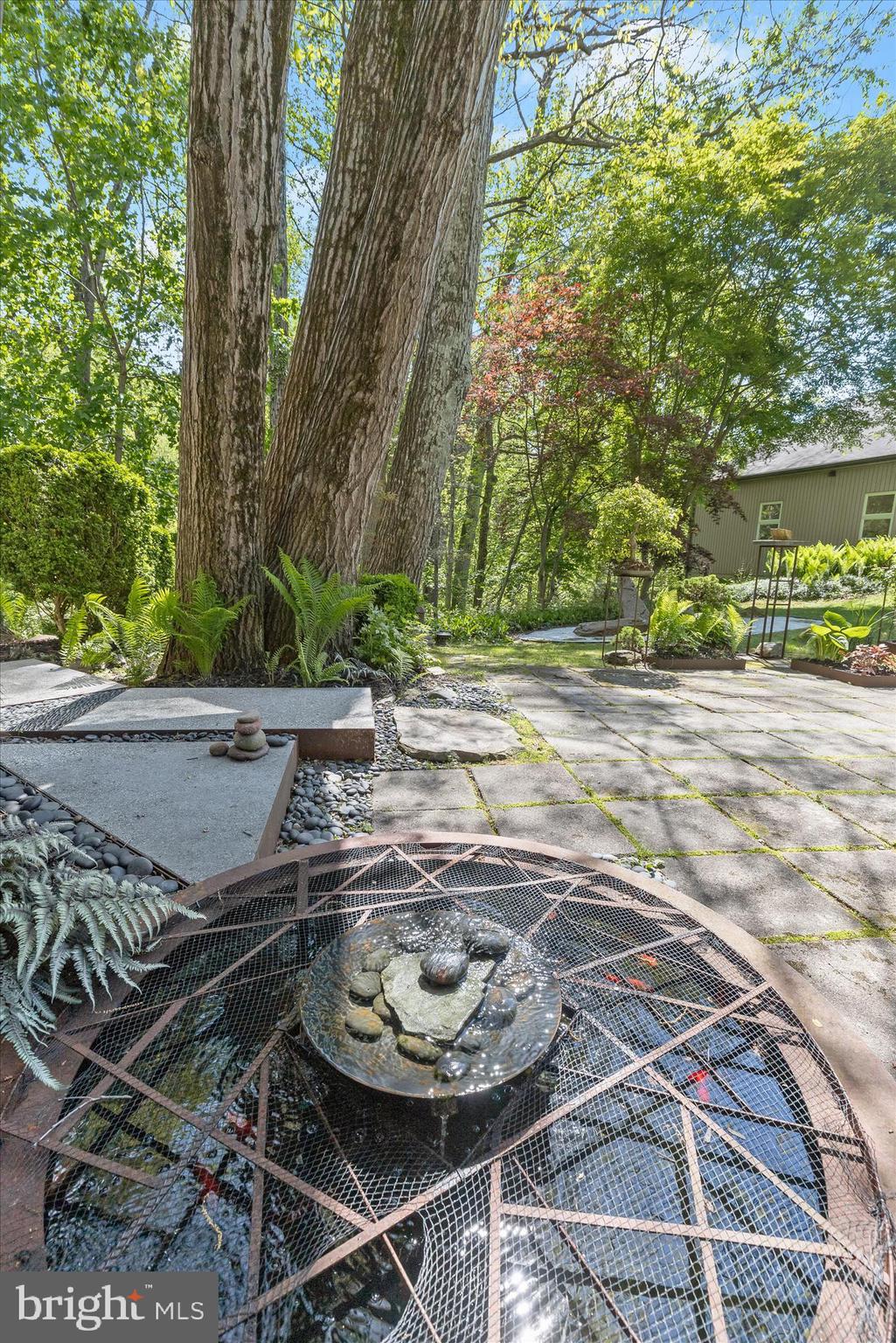 927 Buckhorn Road Sykesville, MD 21784 - Photo 108 of 147 a view of a backyard with fountain